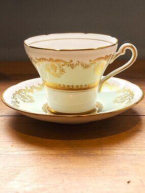 Midcentury cup & saucer in mint green & gold by Royal Stafford.